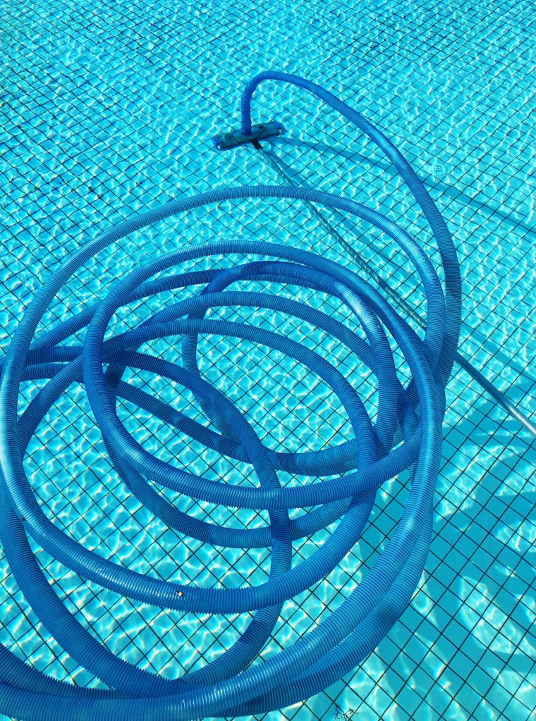 pool-vacuum-cleaner-in-a-swimming-pool-2022-11-16-14-19-16-utc